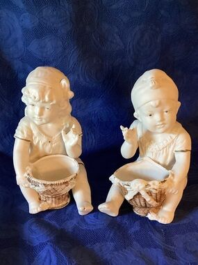 2 Antique Bisque Porcelain Children Figurines Holding Baskets.